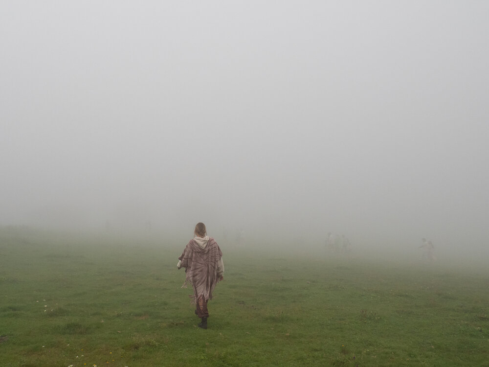 Leyla walking in fog